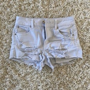 American Eagle White Ripped Denim Shorts. -size 0